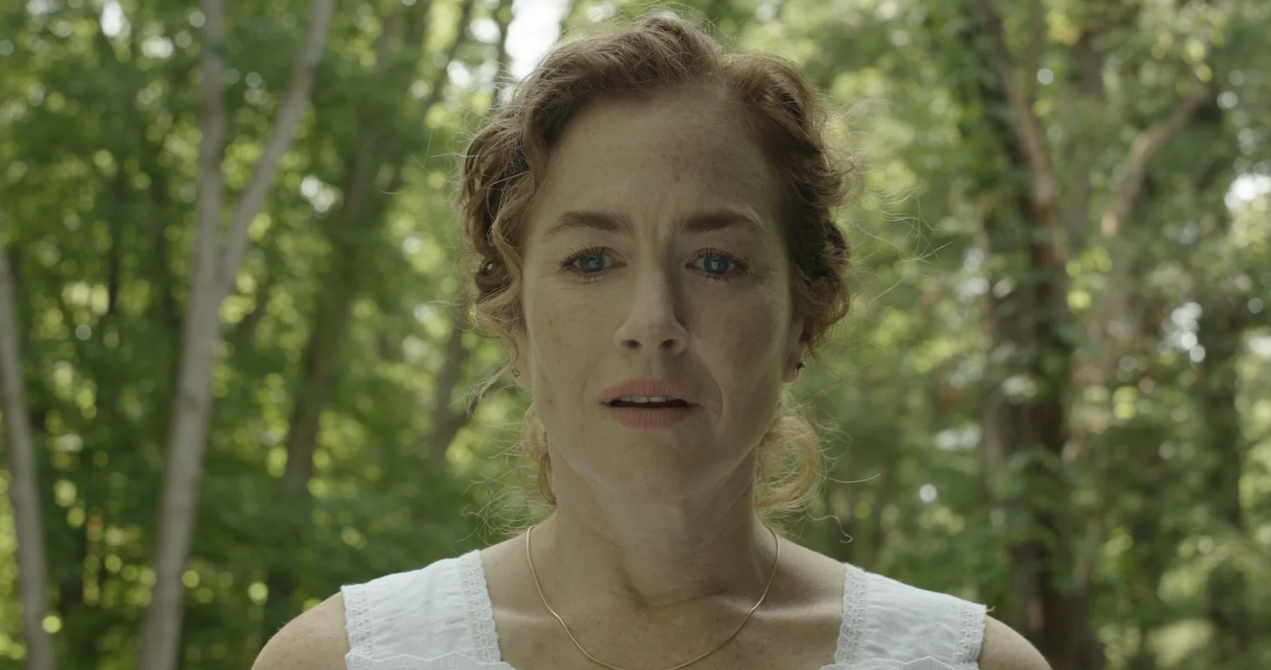 Close-up of Sonia in the woods